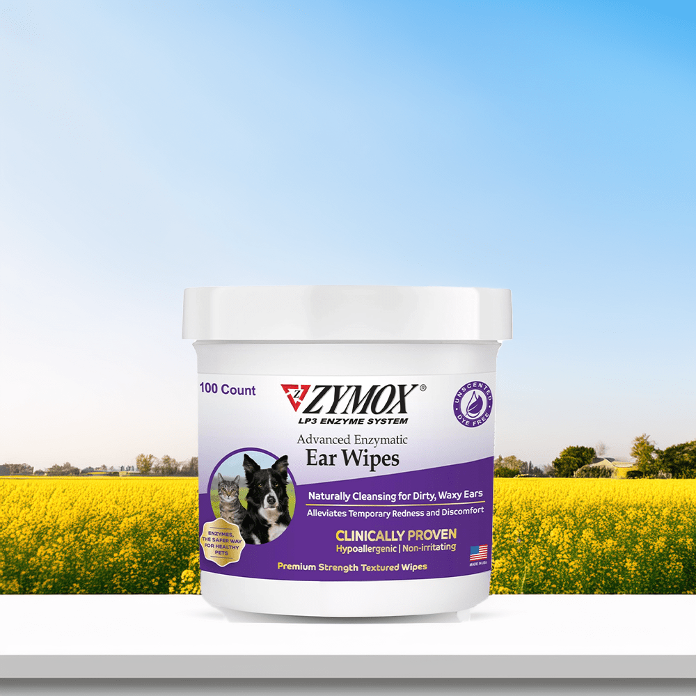 Zymox Advanced Enzymatic Ear Wipes – Gentle & Effective Dog Ear Cleaning A container of Zymox Advanced Enzymatic Ear Wipes placed against a bright countryside background. These clinically proven, hypoallergenic wipes provide an easy and effective solution for dog ear cleaning, removing dirt, wax, and debris while soothing irritation.